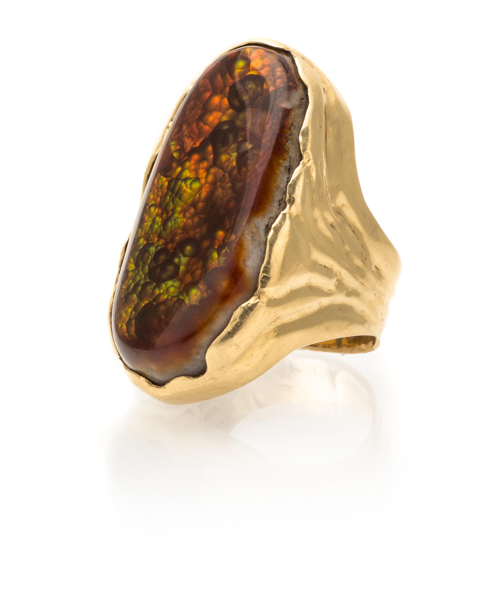 A Collection of 14 Karat Yellow Gold, Jade, Fire Agate and Hardstone Rings, Theodore Drendel, 26.50 dwts.