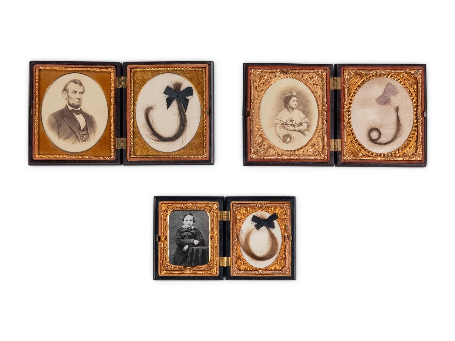 [LINCOLN FAMILY]. Locks of hair purportedly from Abraham Lincoln, Mary Todd Lincoln, and William ("Willie") Lincoln.