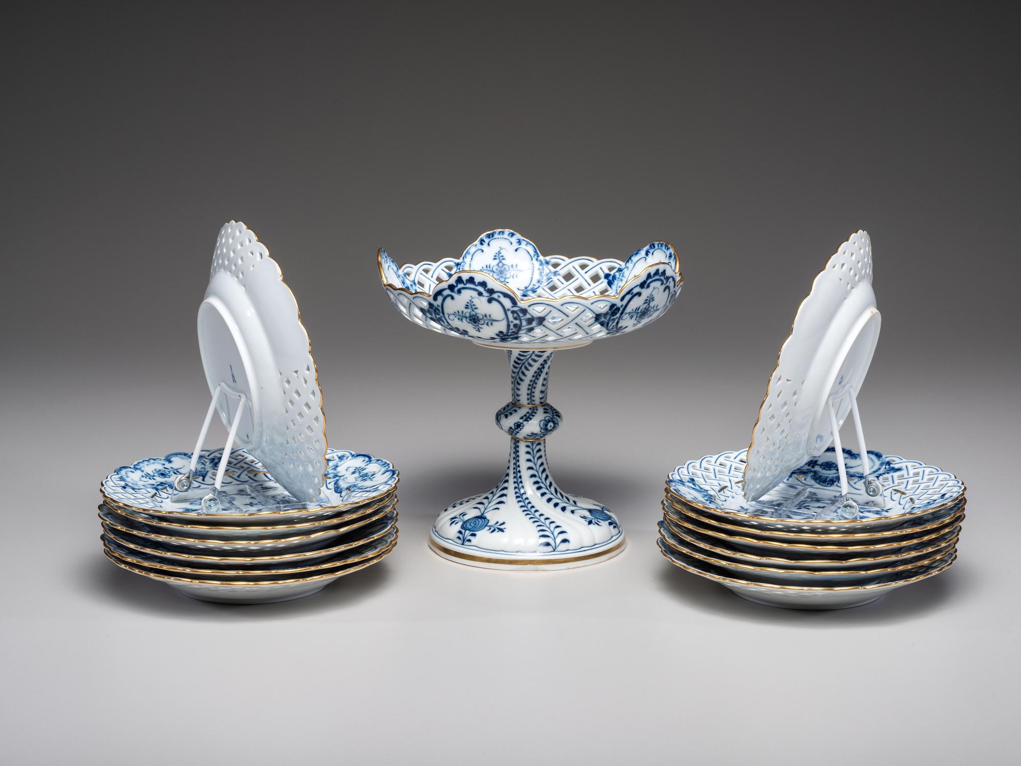 Fourteen Meissen ' Blue Onion' Reticulated Porcelain Plates