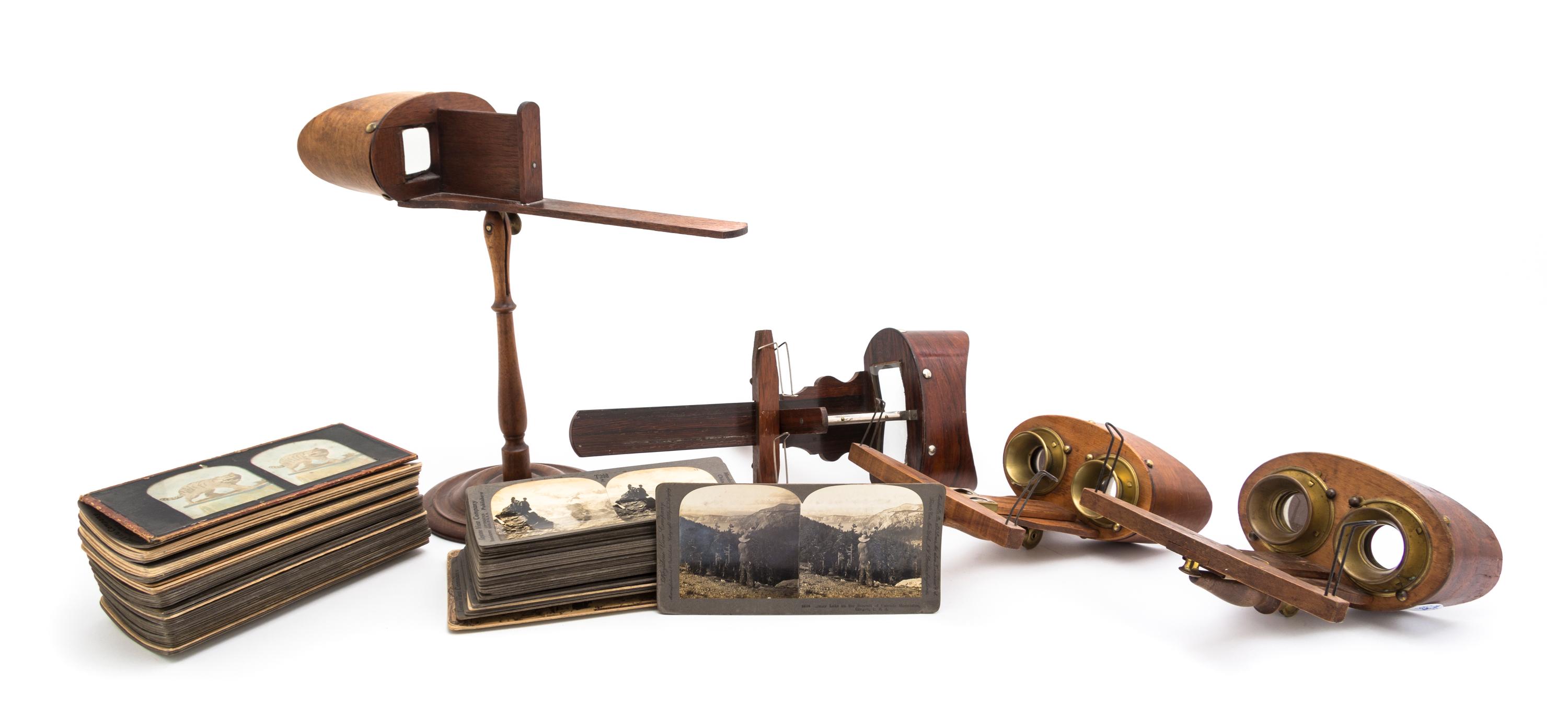 A Collection of Four Stereoscopic Viewers, Height of tallest overall 12 1/4 inches.