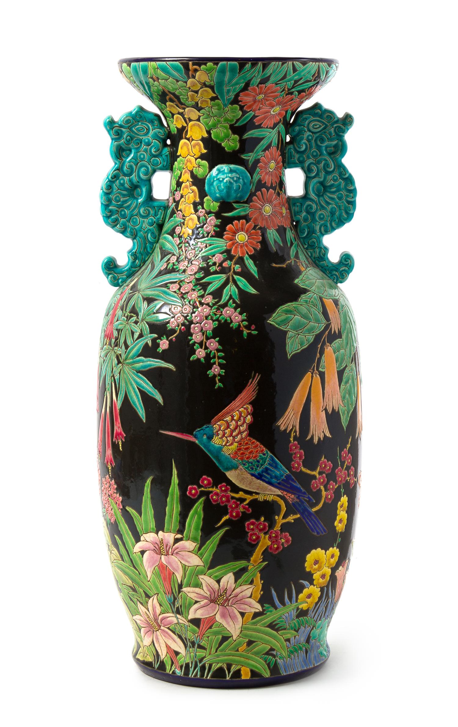 A French Faience Twin-Handled Floor Vase Height 23 3/4 inches. — 1944, DESIGNED BY MAURICE PAUL CHEVALLIER (FRENCH, 1892-1987) FOR FAIENCERIES ET EMAUX DE LONGWY