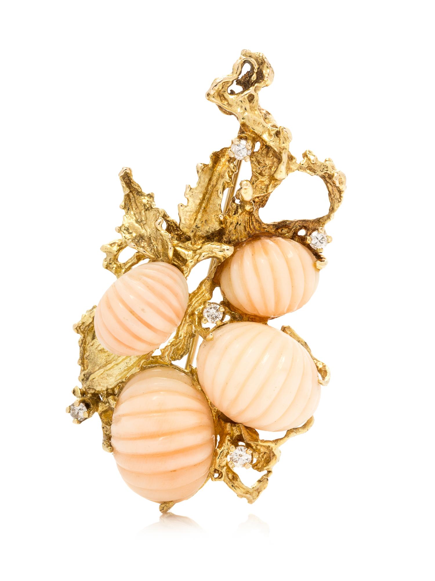 A Yellow Gold, Angel Coral and Diamond Brooch, 16.10 dwts.