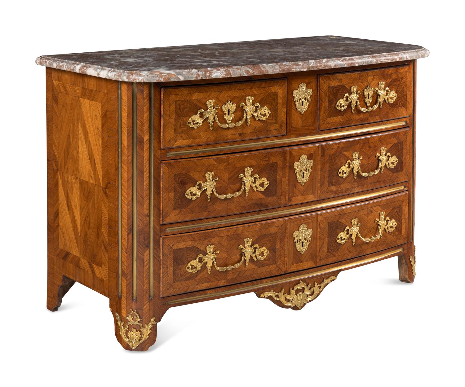 A Régence Gilt Bronze Mounted Walnut Parquetry Commode