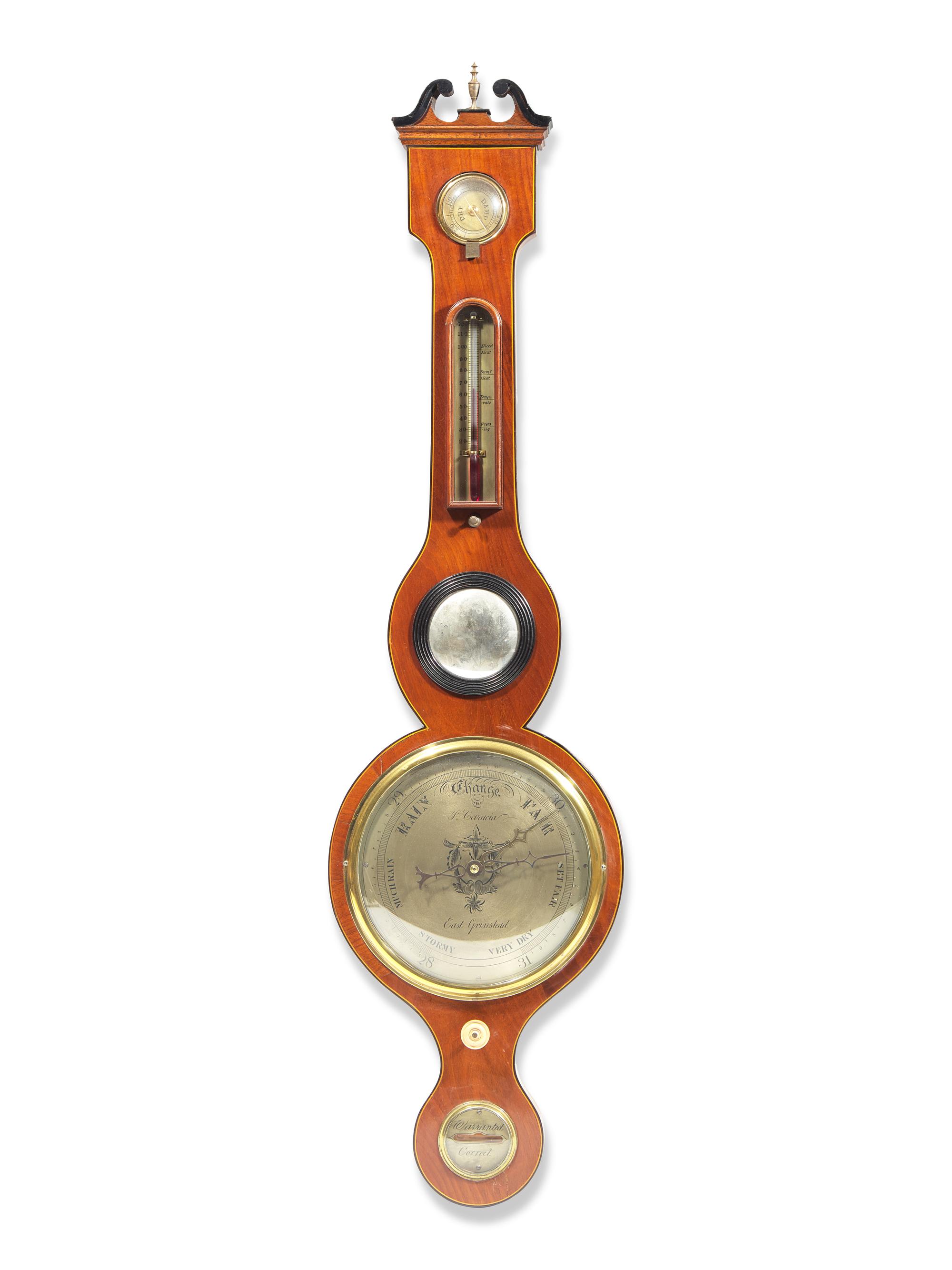 A Regency Brass Mounted and Banded Mahogany Wheel Barometer