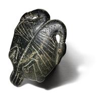 An Egyptian Steatite Cosmetic Palette in the Form of a Double Duck