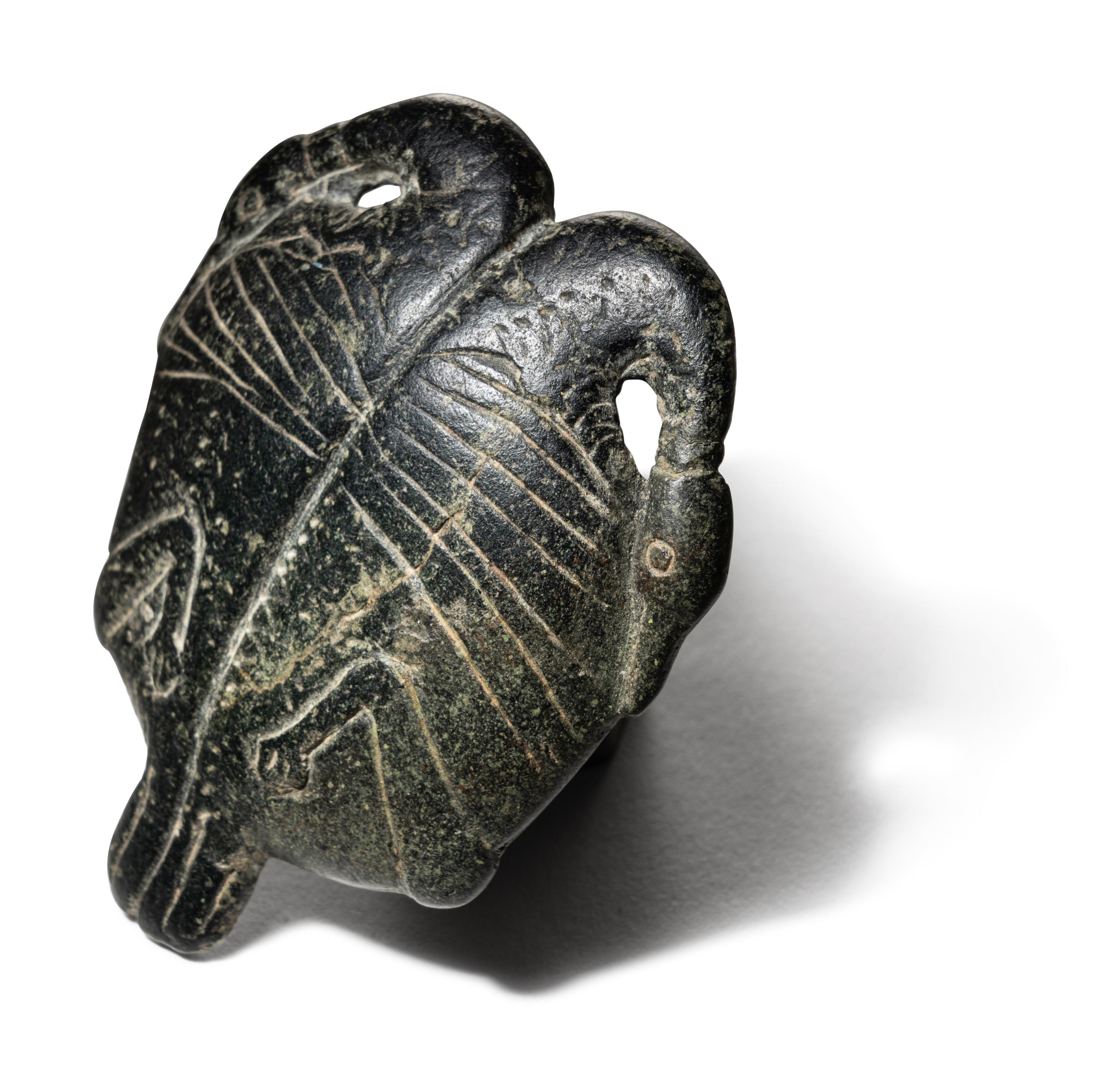 An Egyptian Steatite Cosmetic Palette in the Form of a Double Duck