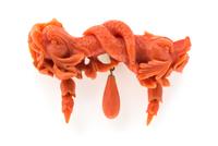 A Victorian Carved Coral Brooch, 12.50 dwts.