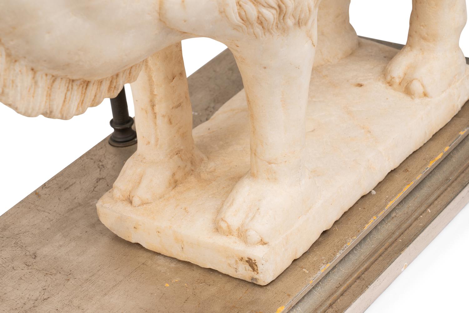 A Pair of Carved Marble Camels