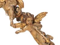 A Florentine Carved Giltwood and Silvered Wood Altarpiece with Musical Putti