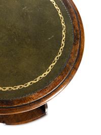 A William IV Mahogany Revolving Book Stand with Candle Branch