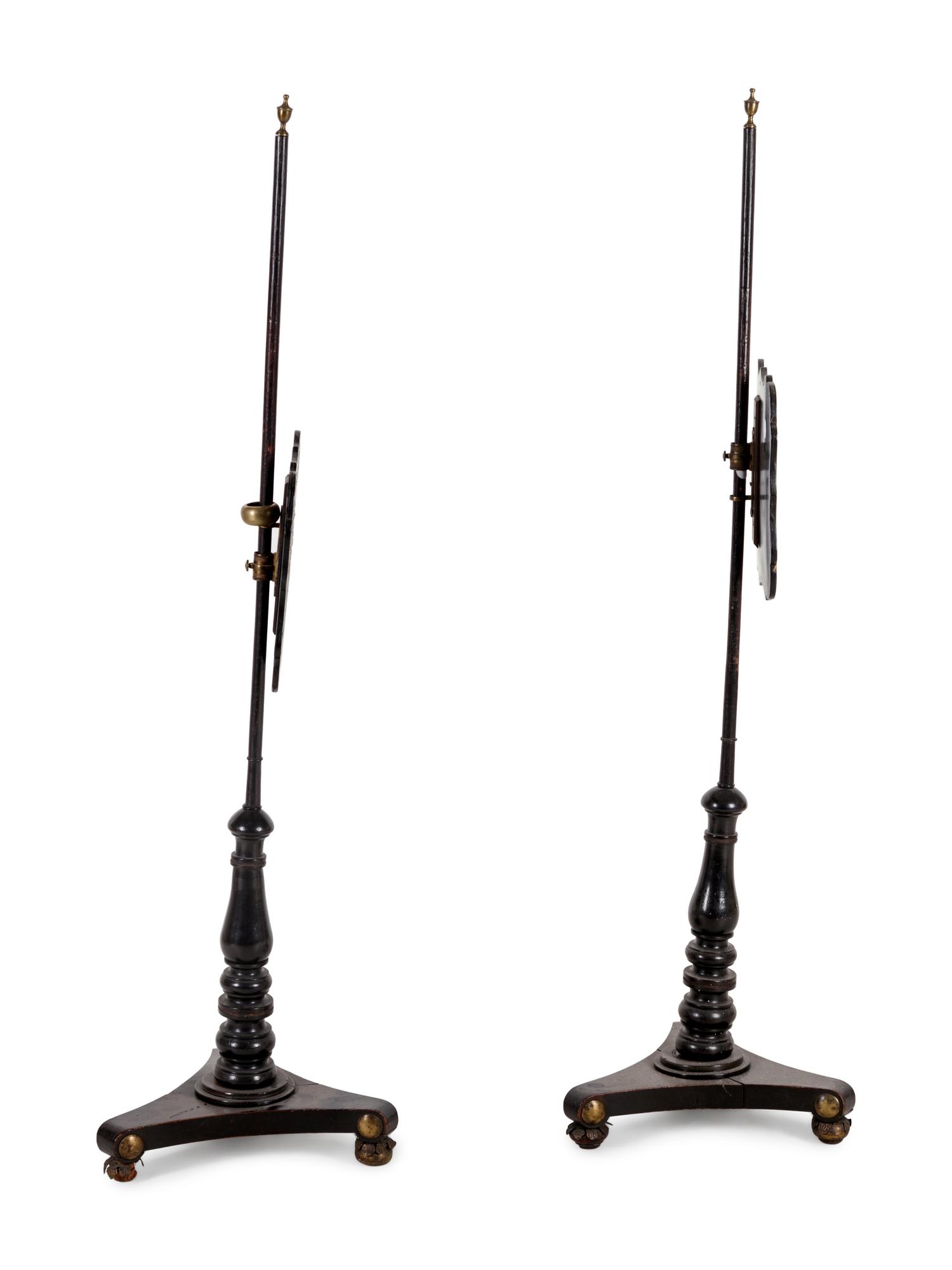 A Pair of Regency Black Lacquered and Chinoiserie Decorated Pole Screens