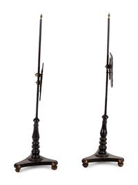 A Pair of Regency Black Lacquered and Chinoiserie Decorated Pole Screens