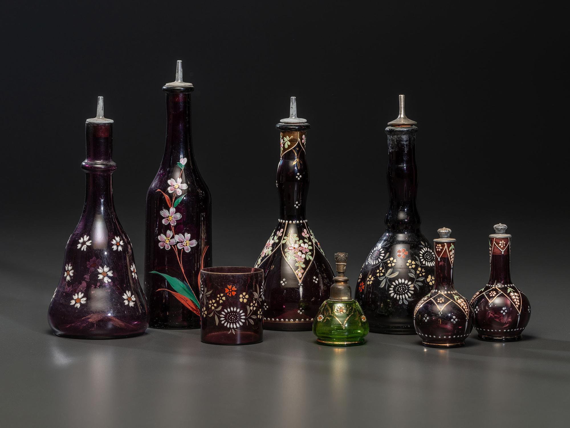 Eight Enameled Amethyst Glass Barber's Items