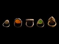 A Group of Five Islamic Stone and Metal Finger Rings