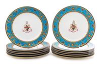A Set of Twelve Minton Armorial Porcelain Plates Diameter 10 1/4 inches.