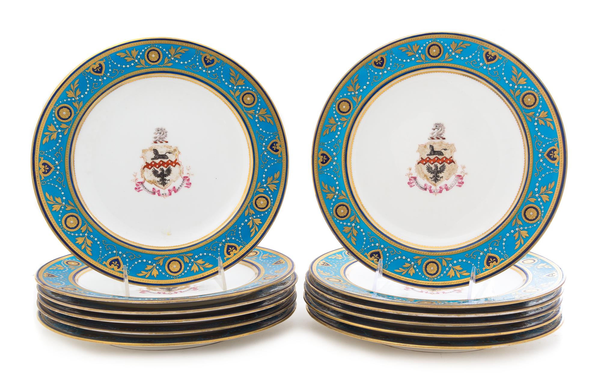 A Set of Twelve Minton Armorial Porcelain Plates Diameter 10 1/4 inches.