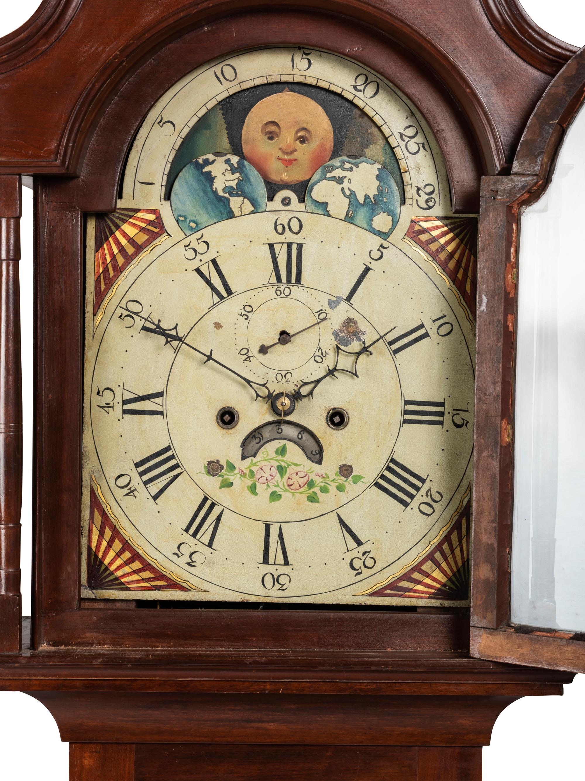 A Federal Carved Cherrywood Tall Case Clock