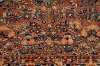 A Sarouk Wool Rug — 20TH CENTURY