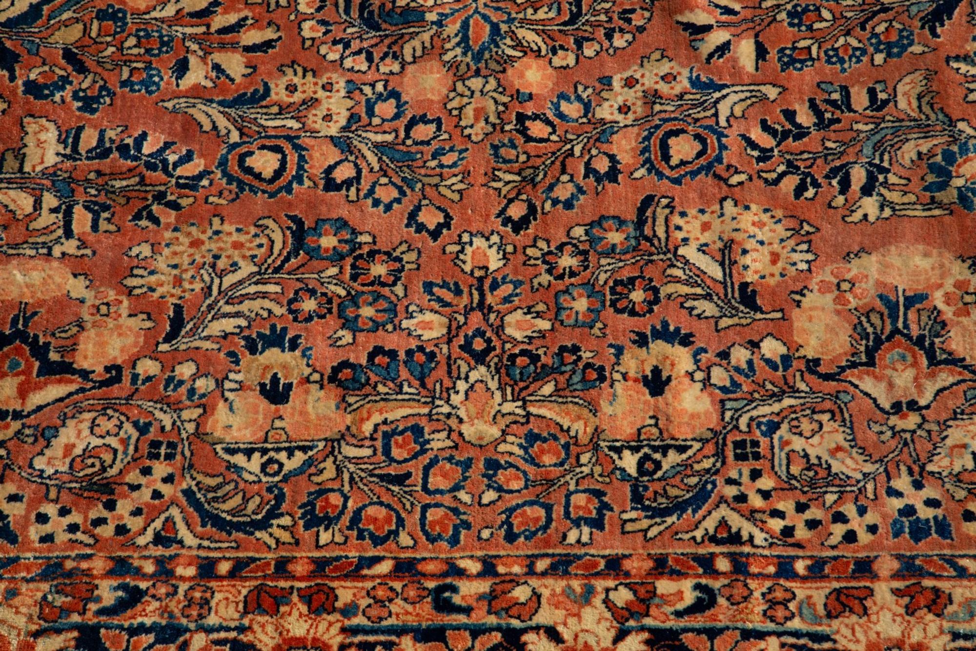 A Sarouk Wool Rug — 20TH CENTURY