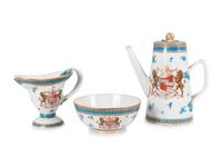 A Samson et Cie Parcel Gilt and Armorial Decorated Part Dinner Service
