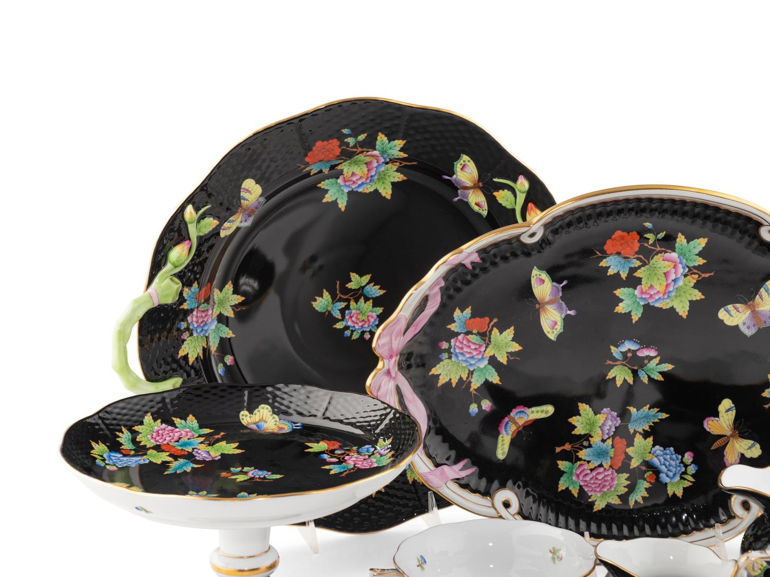 A Herend Queen Victoria Black Porcelain Dinner Service