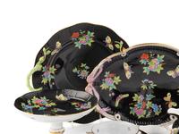 A Herend Queen Victoria Black Porcelain Dinner Service