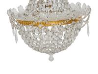 An Empire Style Gilt Bronze and Cut Glass Chandelier