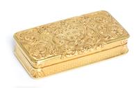 A French 18 Karat Gold Snuff Box, Possibly Louis Tassin, Paris, the lid worked with foliate volute and floral elements and centered by
