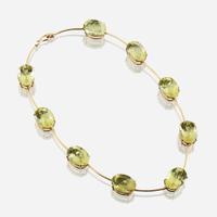 A citrine and eighteen karat gold necklace