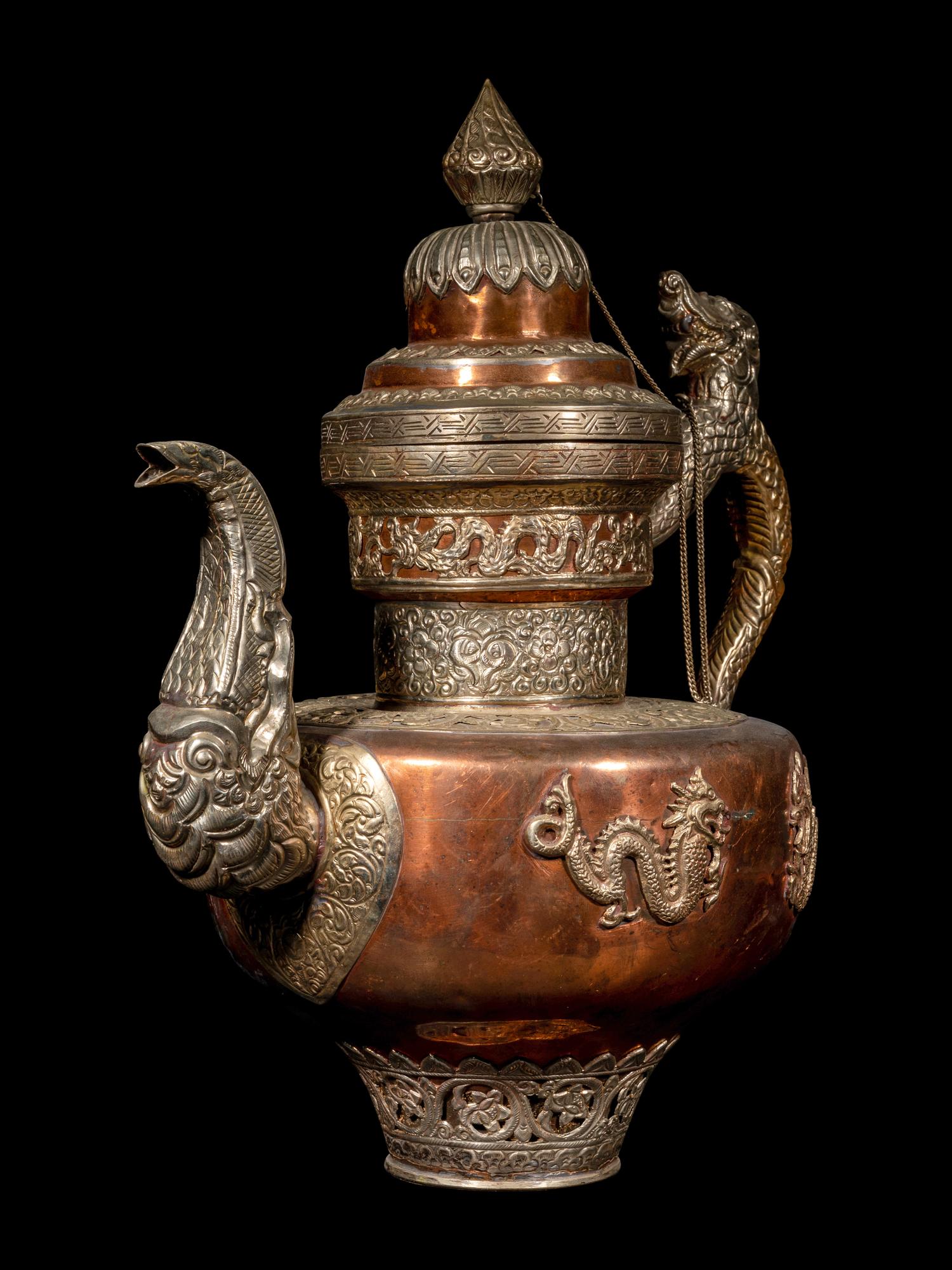 A Tibetan Silver and Copper Covered Ewer and A Chinese Bronze Pitcher
