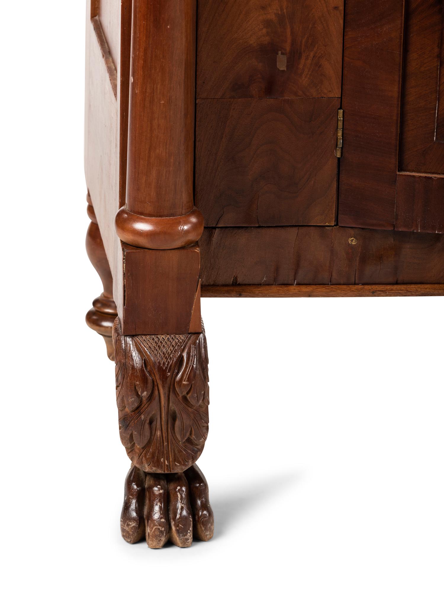 A Classical Figured Cherrywood and Mahogany Veneered Dresser