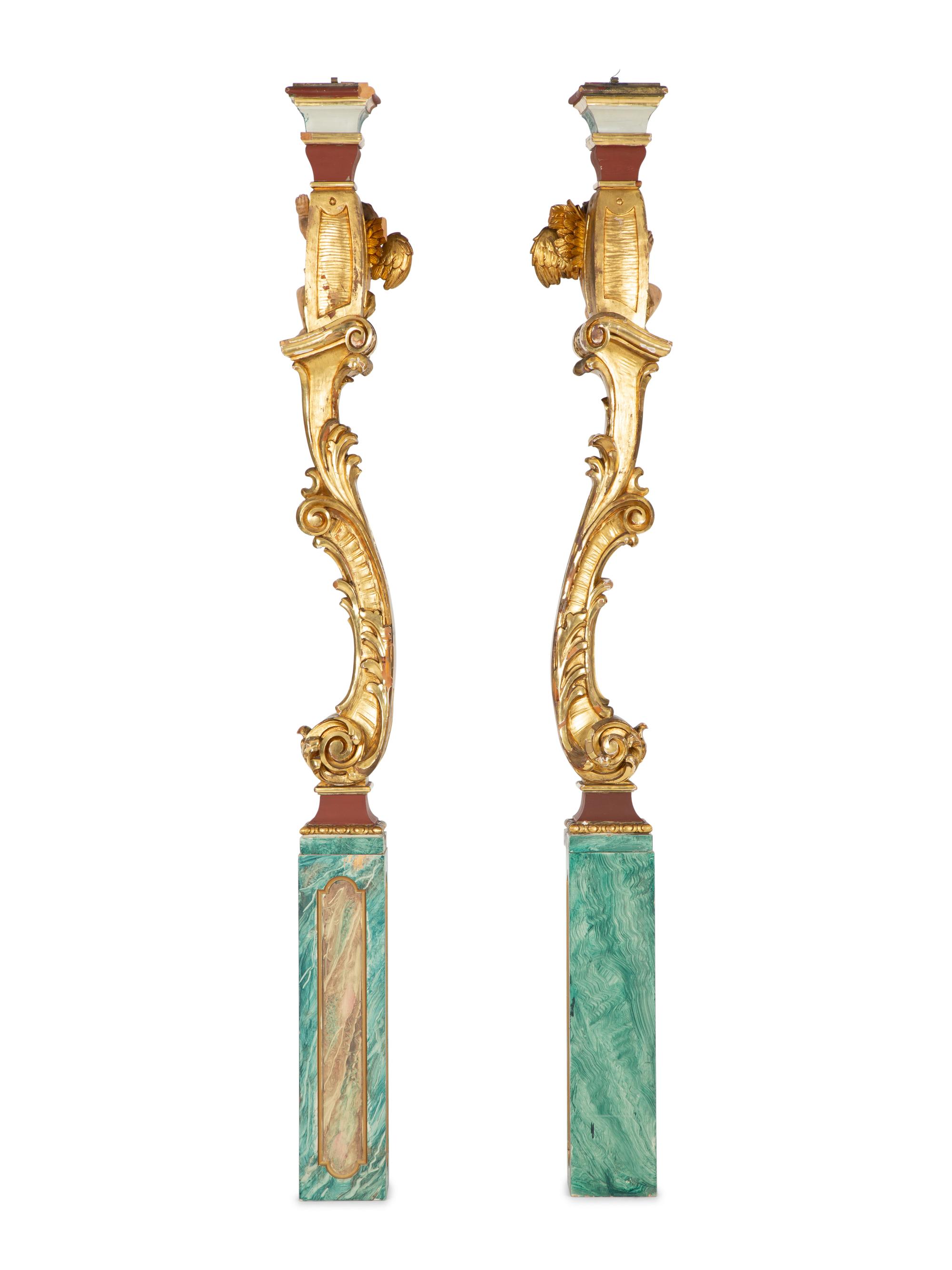 A Pair of Venetian Painted and Parcel Gilt Columns with Putti