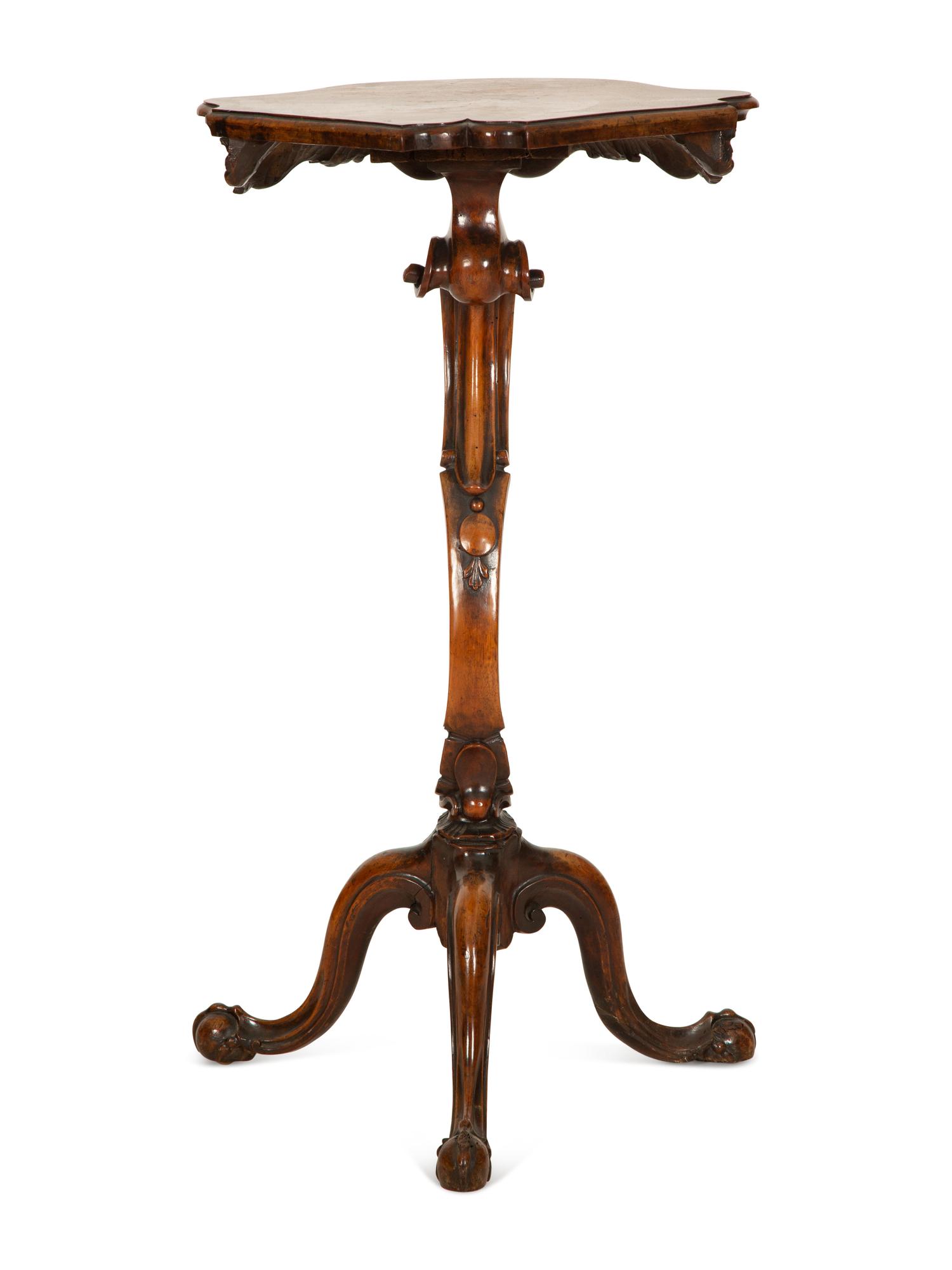 An Italian Rococo Carved Walnut Tripod Stand