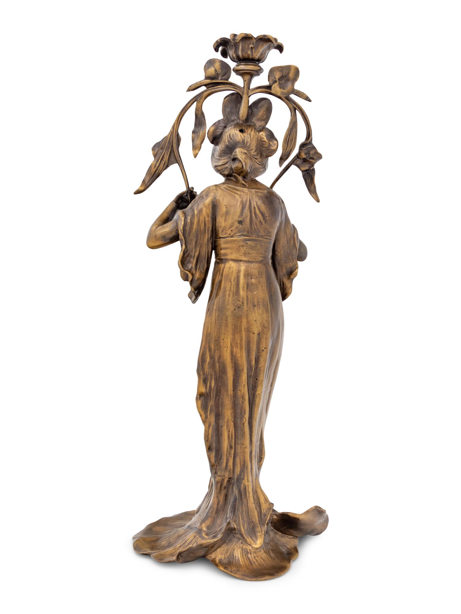 An Art Nouveau Gilt Bronze Figural Candlestick