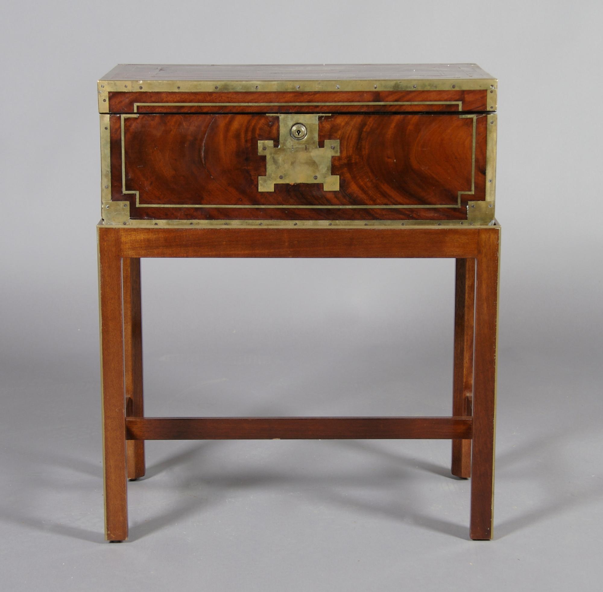 An English Brass Mounted Trunk Table, Height of box 7 1/2 x width 20 3/4 x depth 11 1/8 inches.