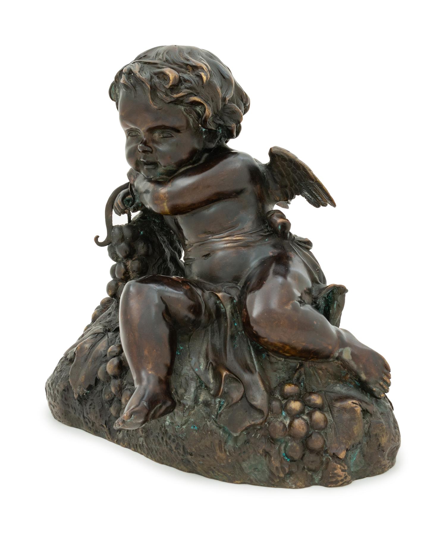 A Continental Bronze Figure of a Putto