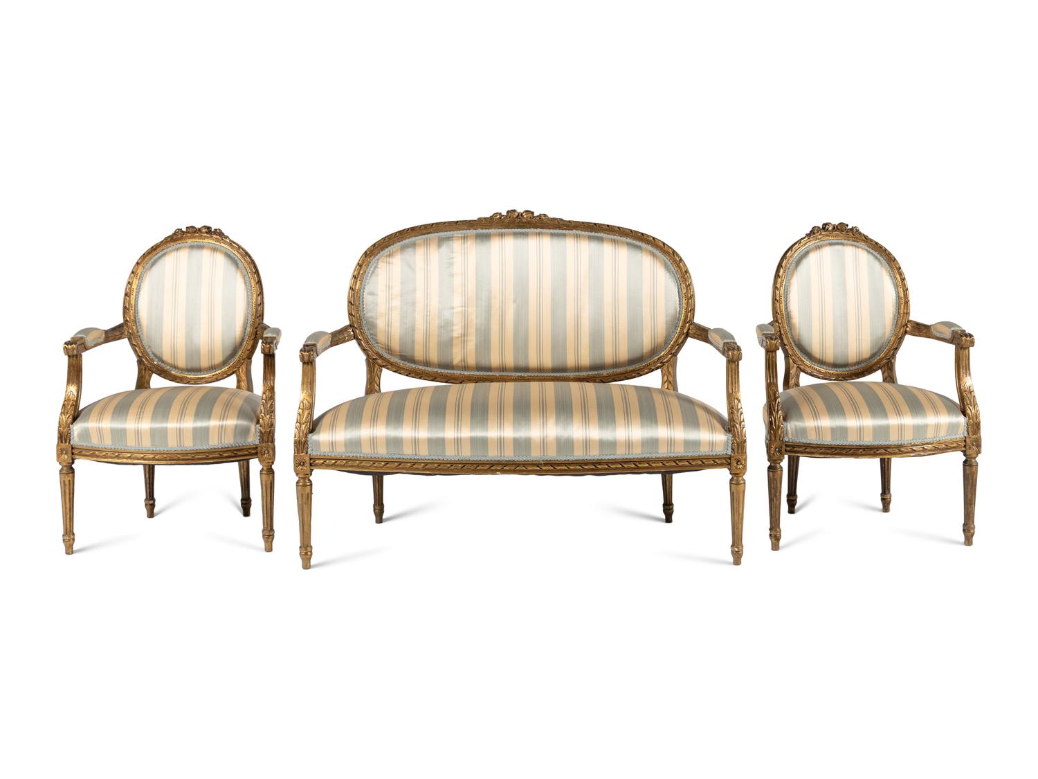 A Louis XVI Style Giltwood Three-Piece Seating Suite