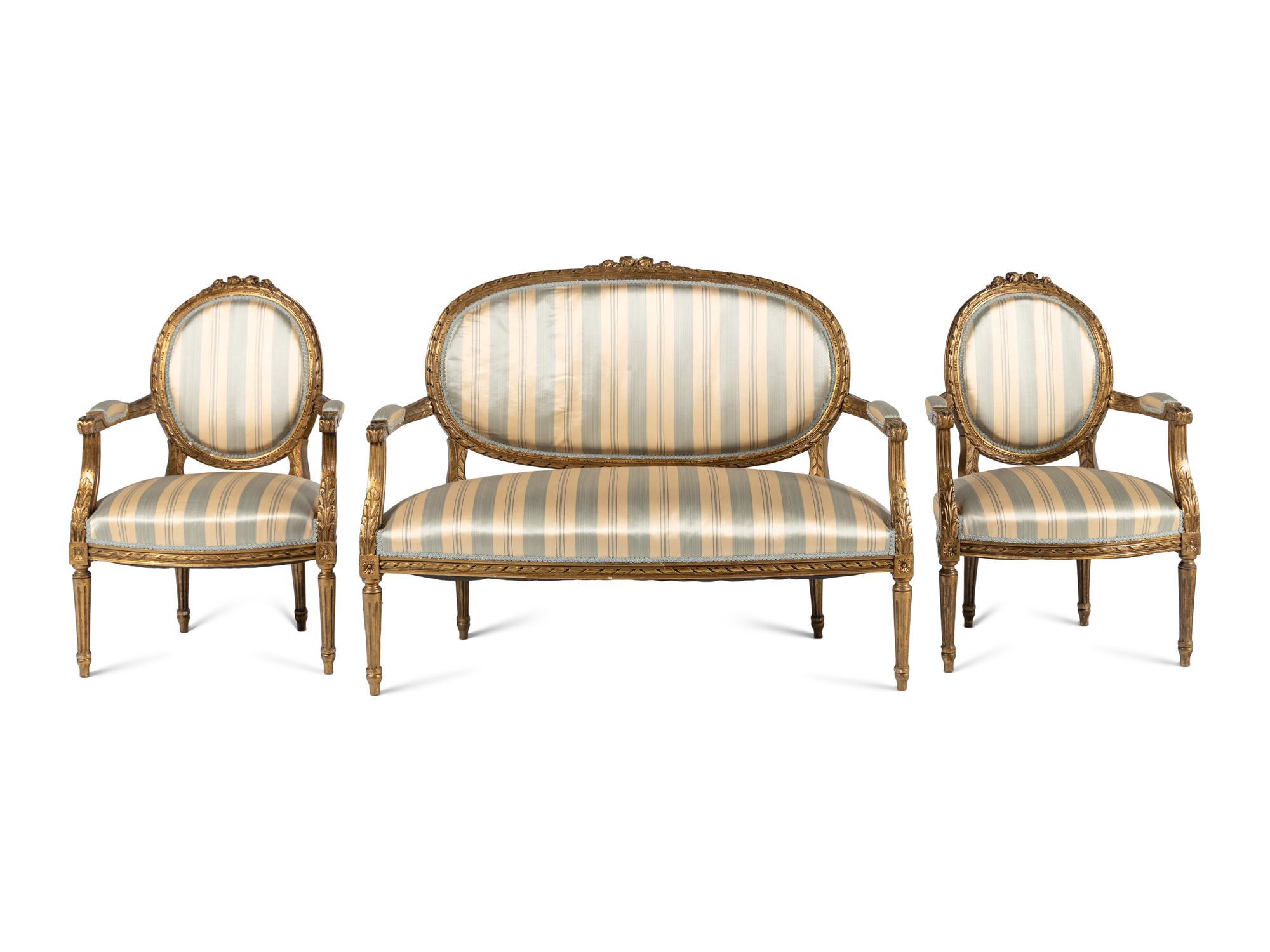 A Louis XVI Style Giltwood Three-Piece Seating Suite