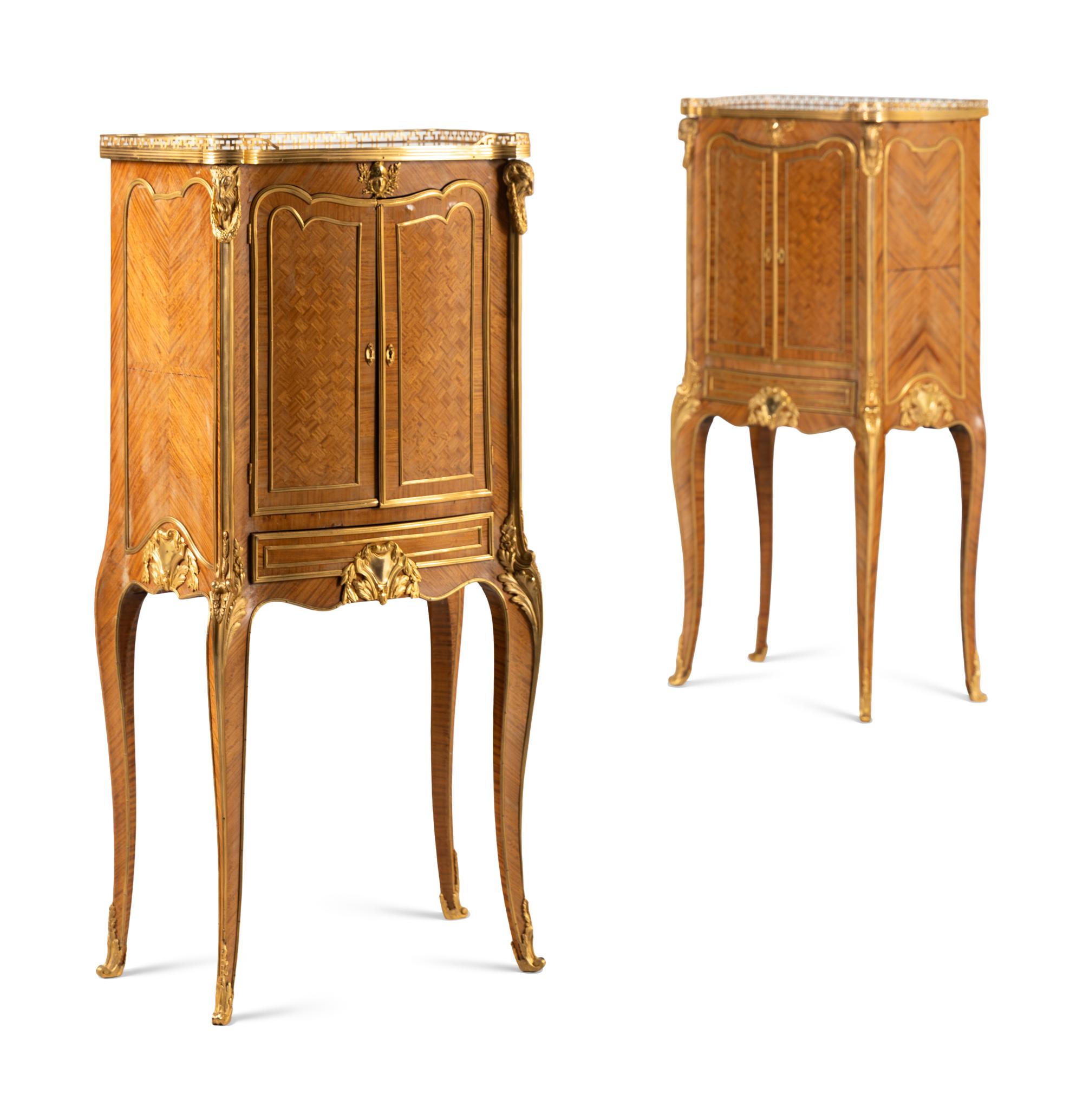 A Pair of Louis XV/XVI Transitional Style Gilt Bronze Mounted Parquetry Cabinets