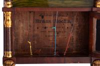 A Mahogany Eglomise and Parcel Gilt Mantel Clock