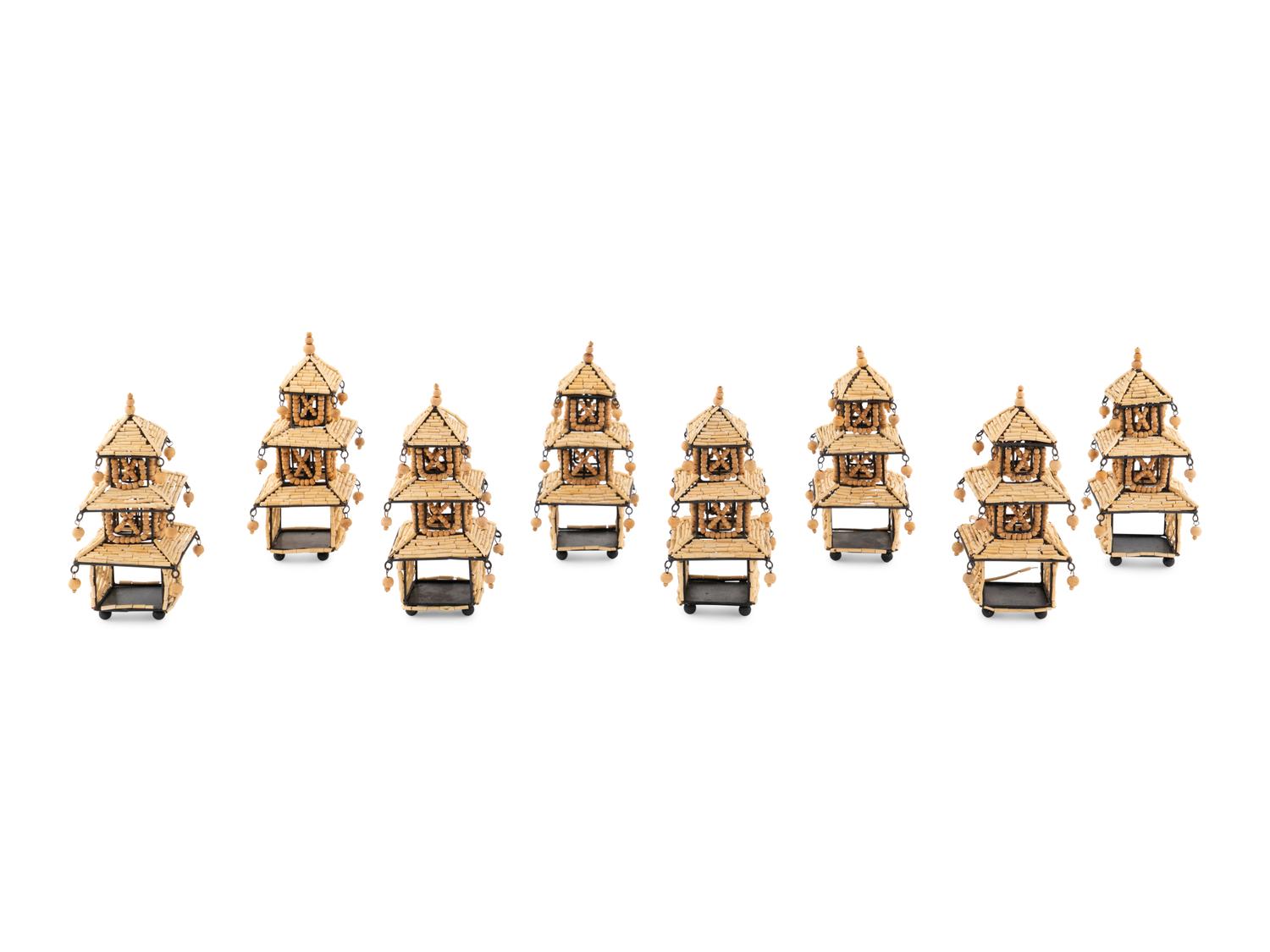 A Set of Eight Beaded Pagoda Napkin Rings