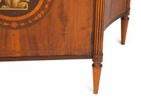 A Joseph Gerte Mahogany and Marquetry Commode