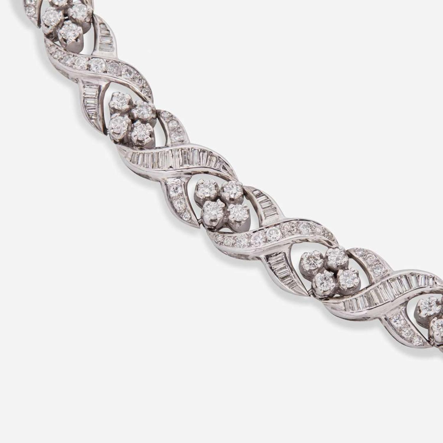 A Matching Set of 14K White Gold and Diamond Necklace and Bracelet