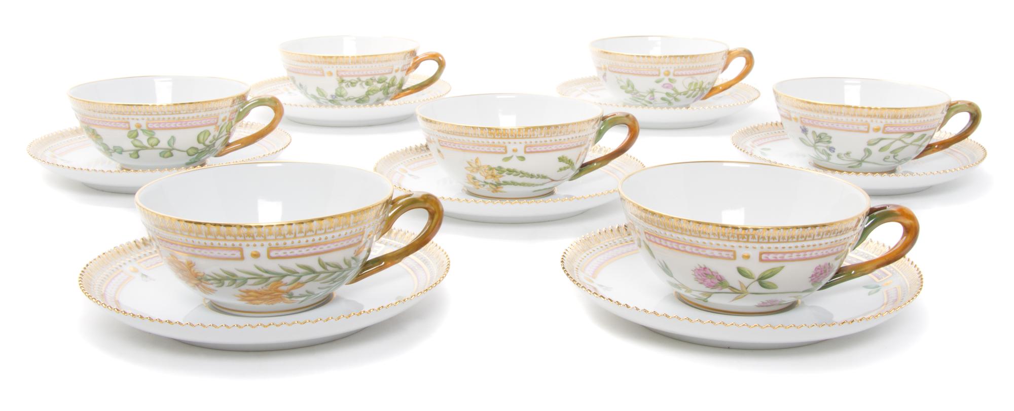 Eighteen Royal Copenhagen Flora Danica Teacups and Saucers Diameter 6 inches.