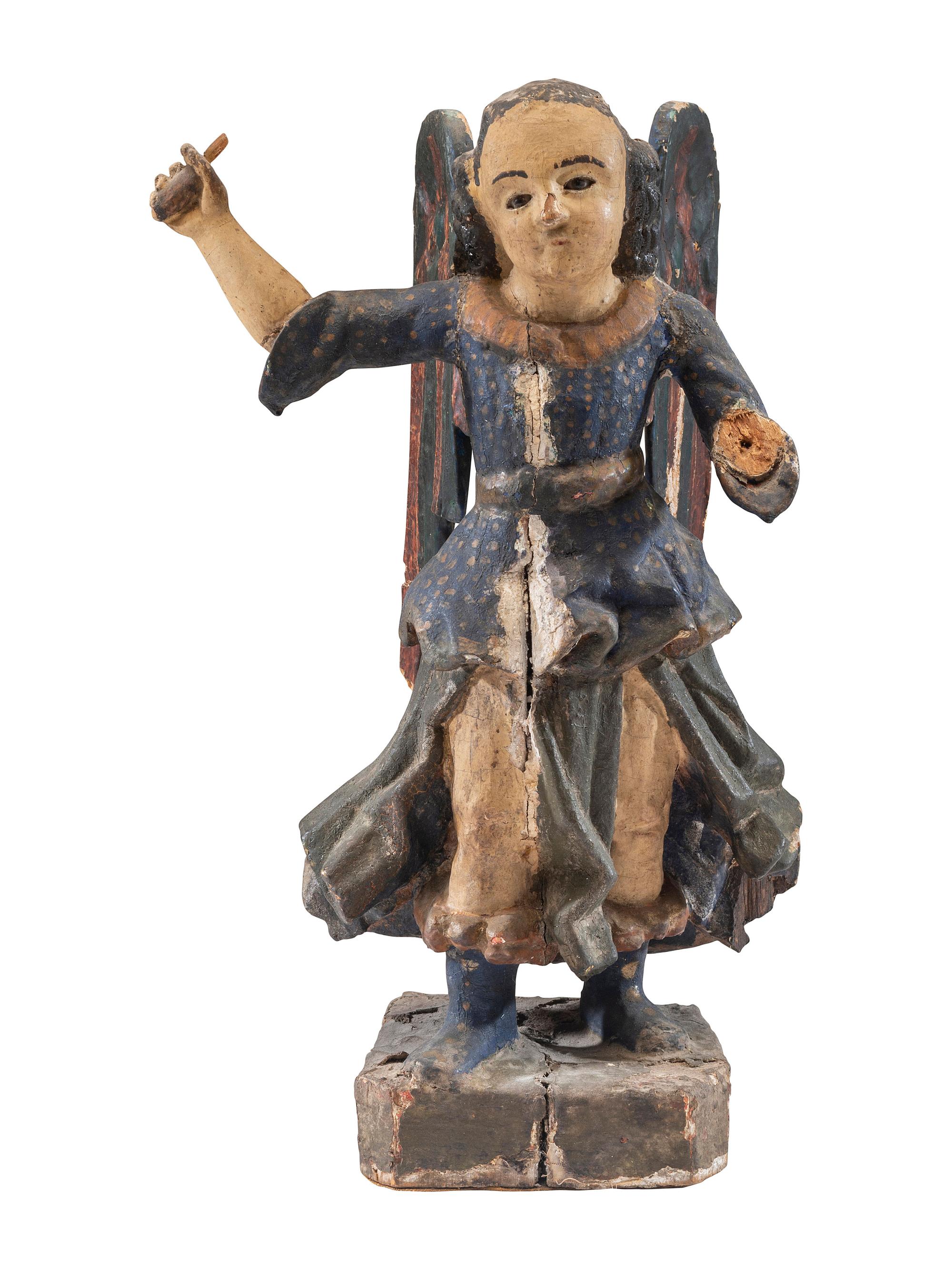A Carved Polychrome Wood Santo Figure of San Miguel