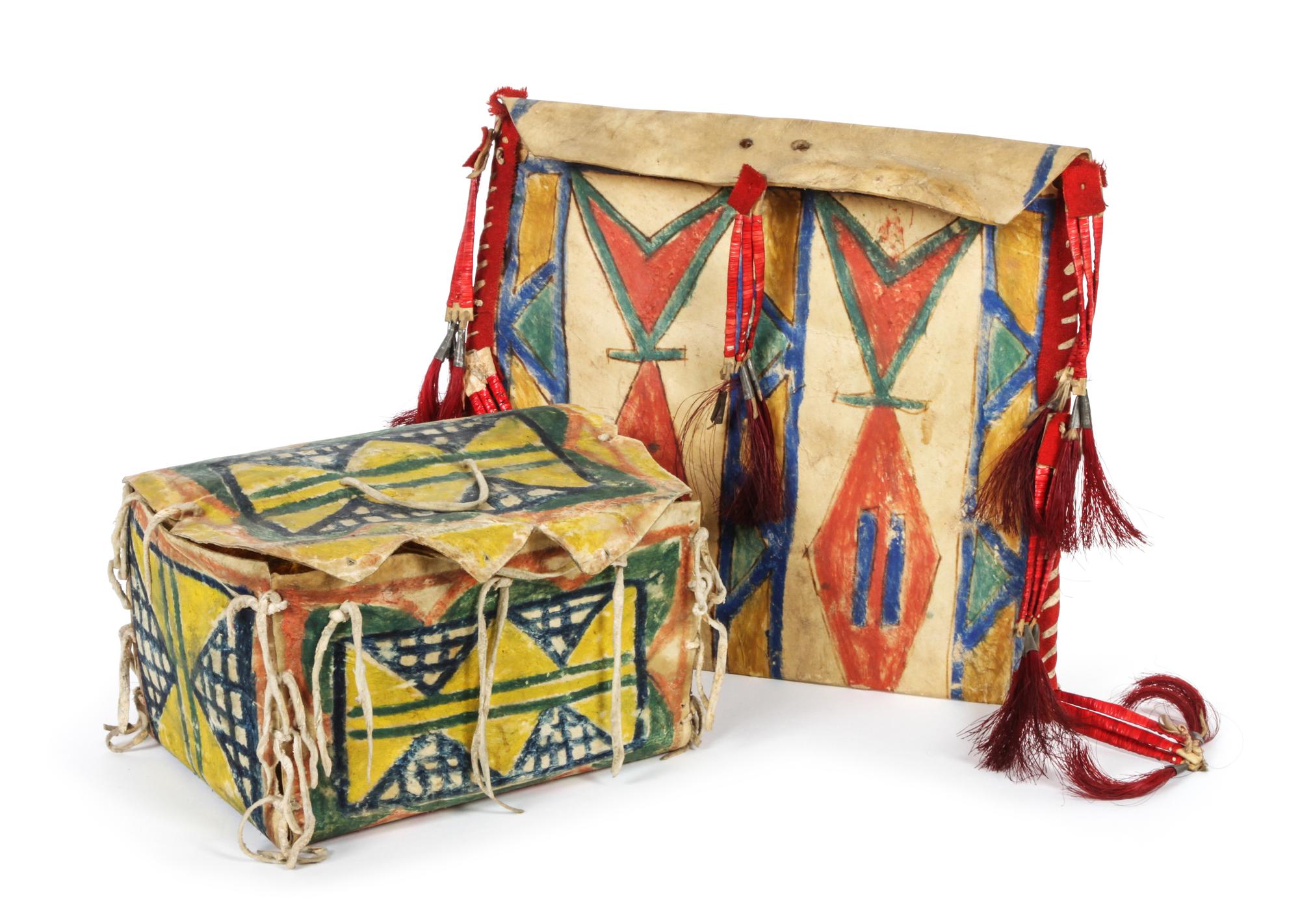 Two Northern Plains Parfleche Items Height of the first 5 x width 8 x depth 5 inches.