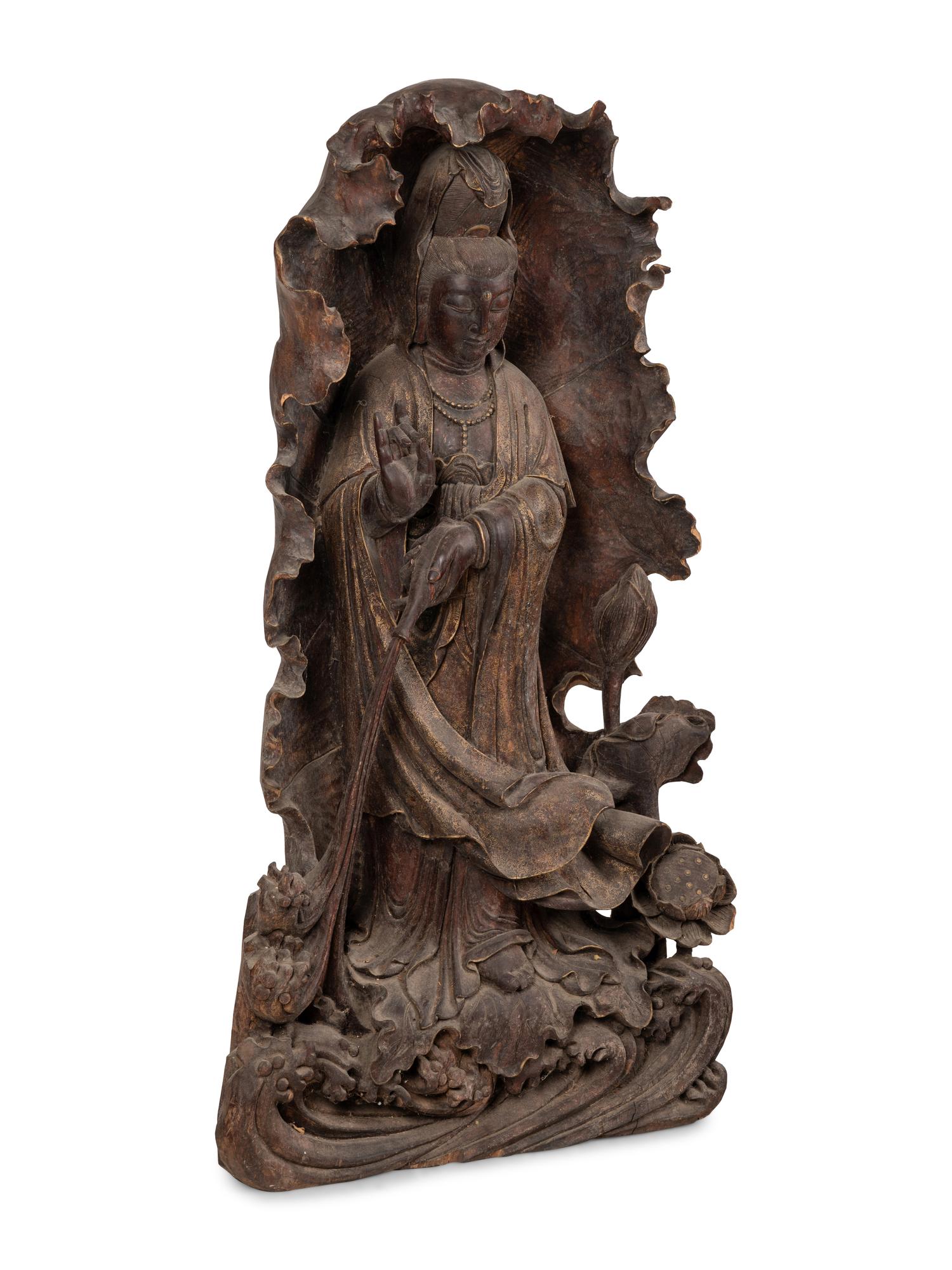A Monumental Chinese Parcel Gilt Carved Harwood Figure of Guanyin