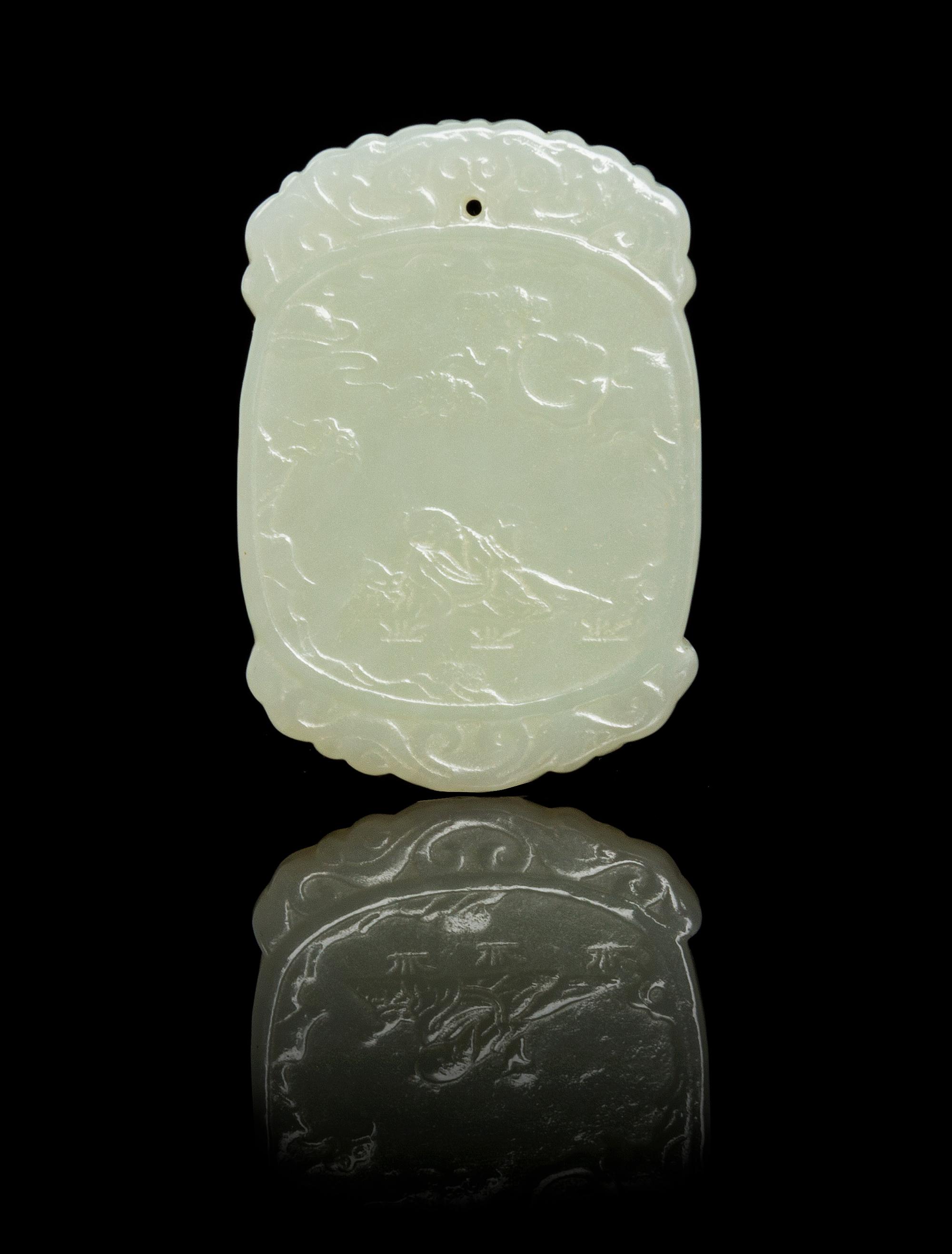 A Celadon Jade Plaque Length 2 1/8 inches.