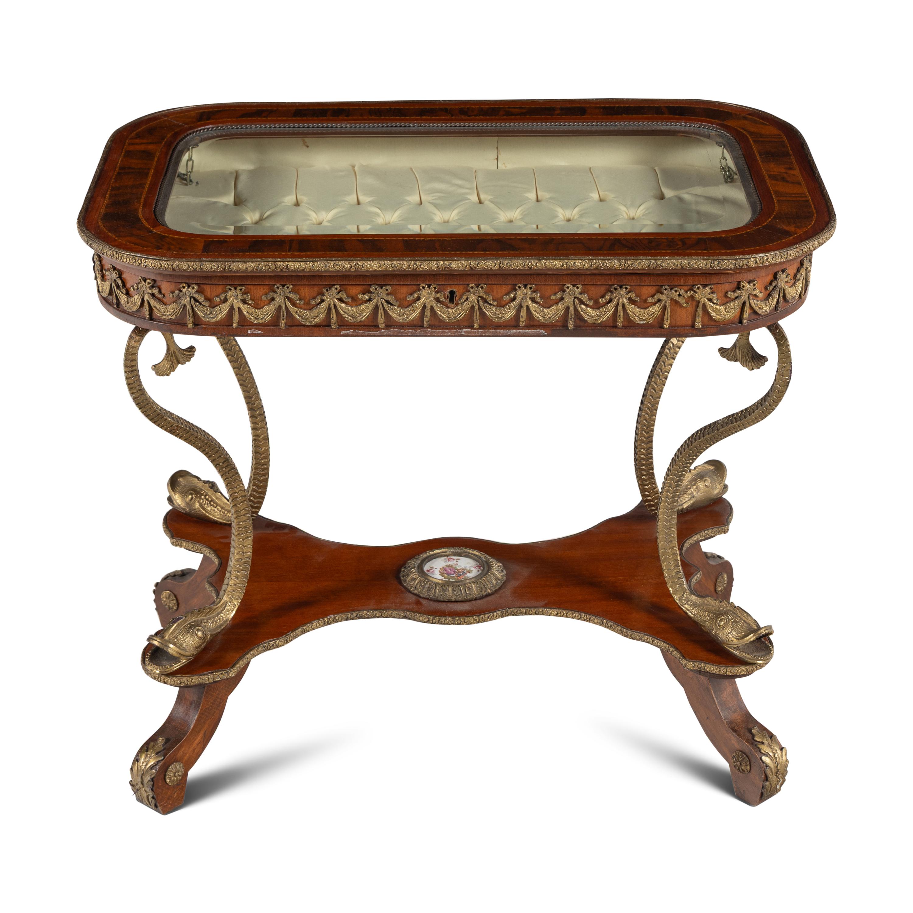 A Neoclassical Style Gilt Metal Mounted Mahogany Vitrine Table