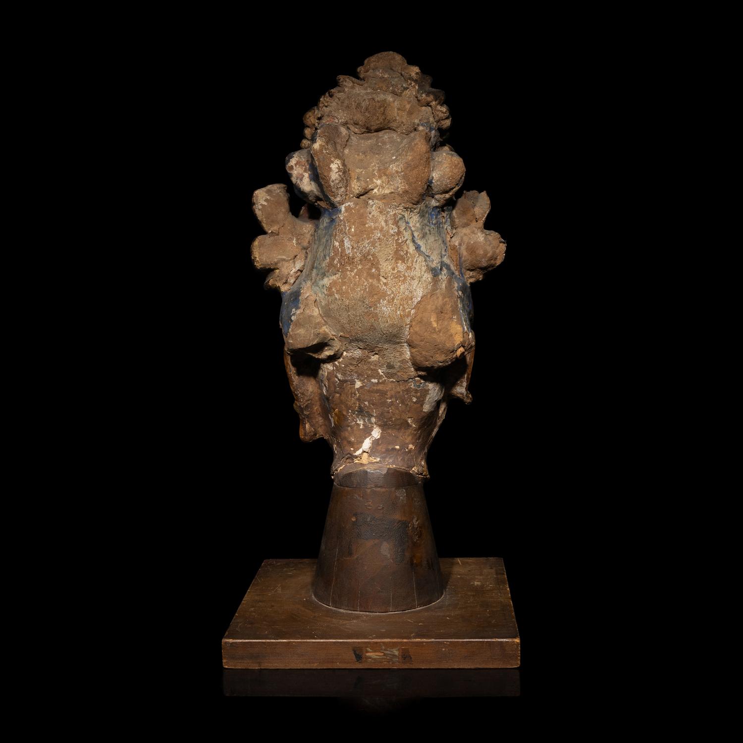 A Chinese Polychrome Painted Stucco Head of a Female Attendant, Song-Ming Dynasty 宋-明 彩繪泥塑侍女頭像